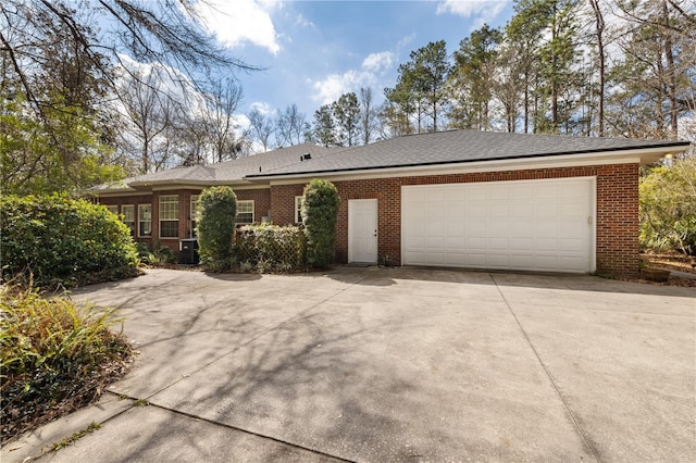 single story home with a garage