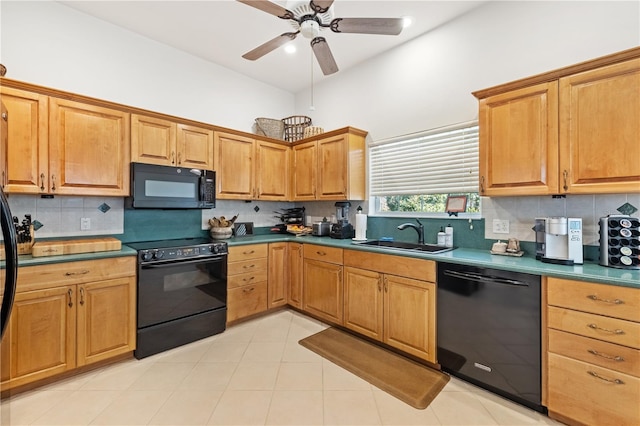 kitchen featuring tasteful backsplash, light tile patterned flooring, sink, and black appliances