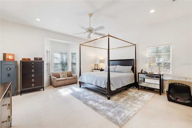 carpeted bedroom with ceiling fan