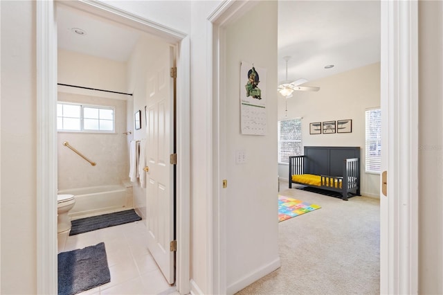 hallway with light tile patterned flooring