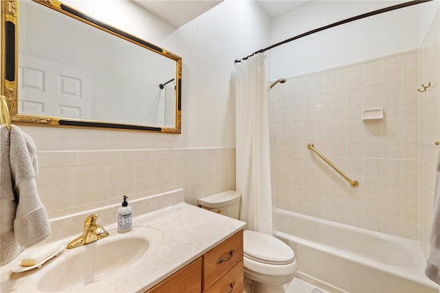 full bathroom with shower / bath combination with curtain, vanity, toilet, and tile walls