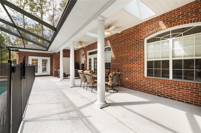 view of patio / terrace with french doors and ceiling fan