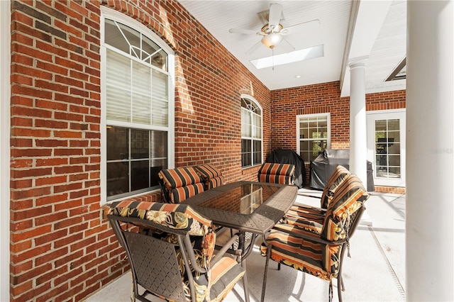 view of patio / terrace featuring ceiling fan