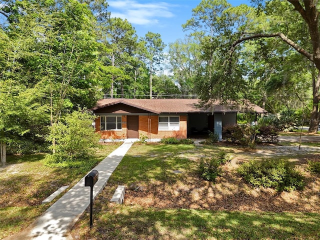 view of front of house with a front lawn