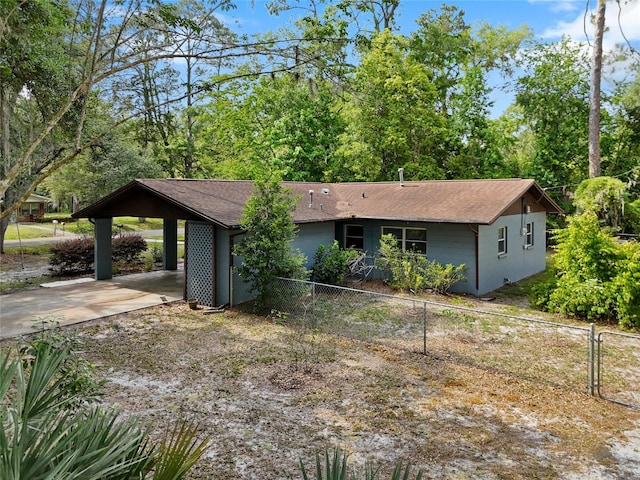 view of front of house featuring a carport