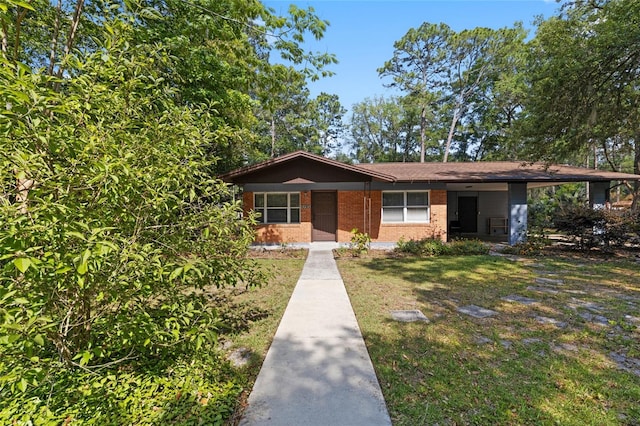 view of front facade with a front yard