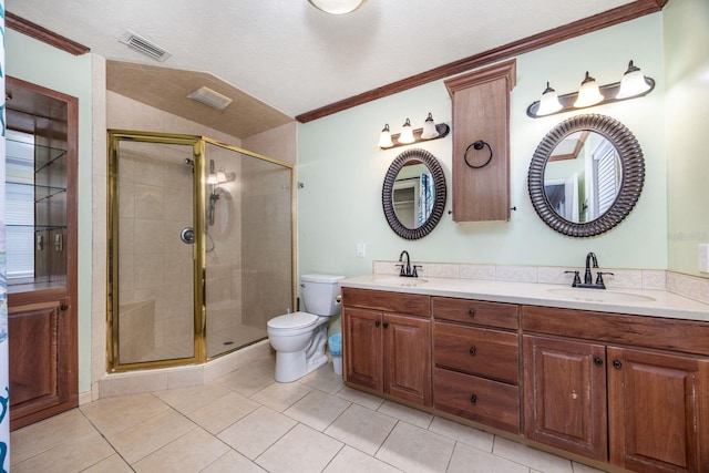 bathroom with vanity, a textured ceiling, a shower with door, and toilet