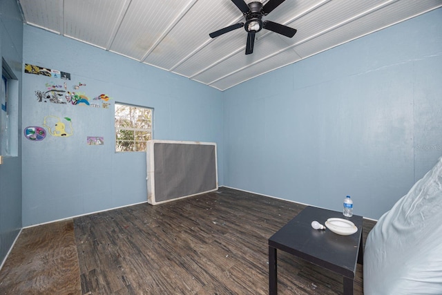 interior space with dark hardwood / wood-style floors and ceiling fan