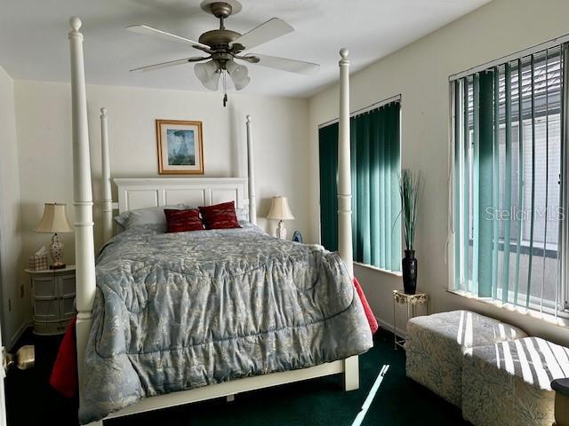 bedroom featuring ceiling fan