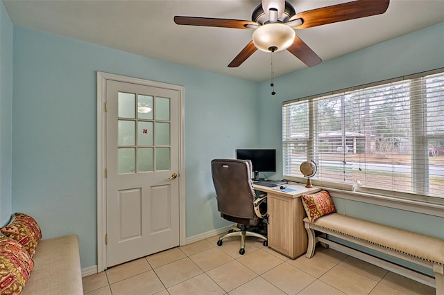 office with light tile patterned floors and ceiling fan