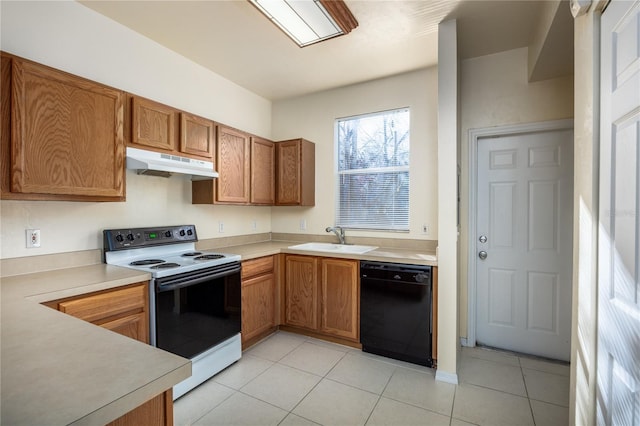 kitchen featuring range with electric cooktop, dishwasher, sink, and light tile patterned floors