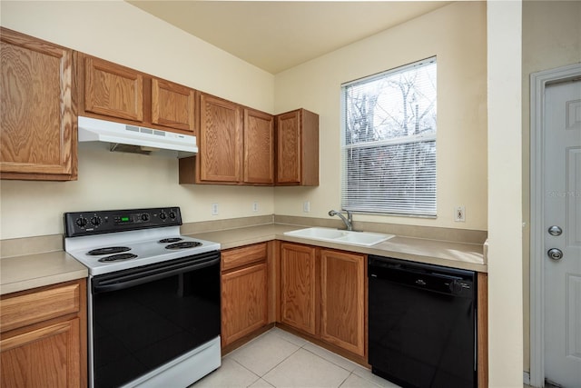 kitchen featuring electric stove, black dishwasher, sink, and light tile patterned floors