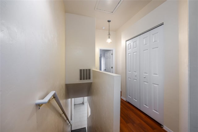 corridor featuring dark wood-type flooring