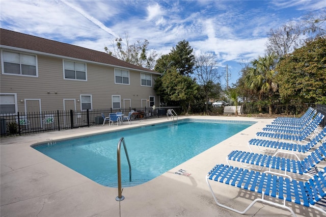 view of swimming pool featuring a patio