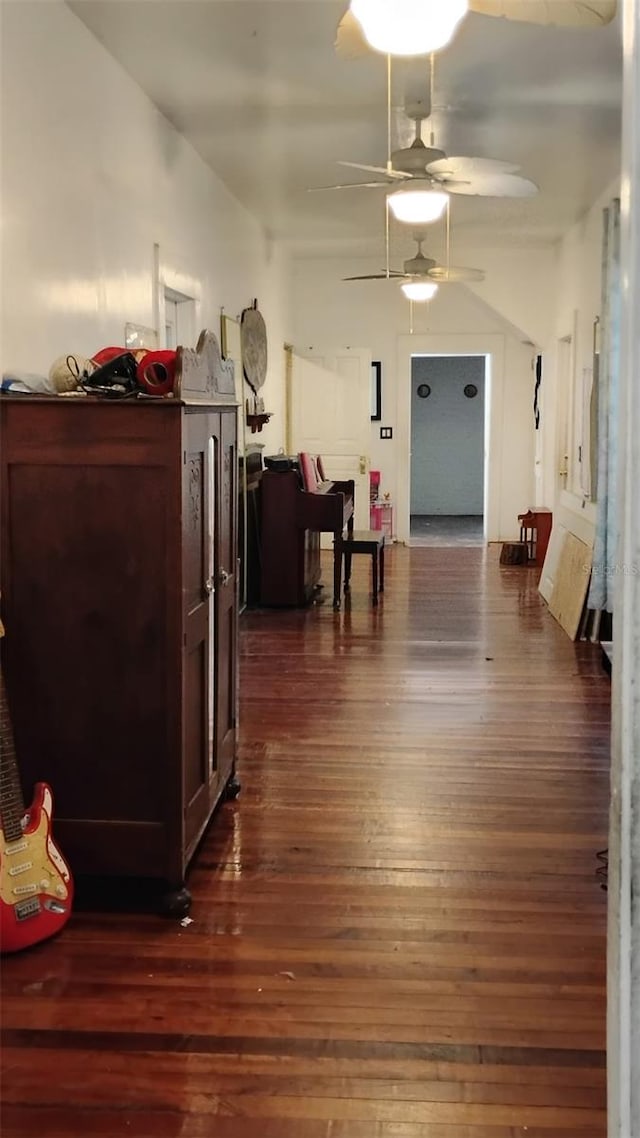 hall with dark hardwood / wood-style flooring