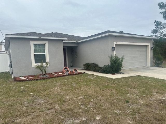 single story home with a garage and a front yard