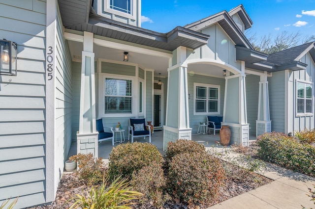 property entrance with covered porch