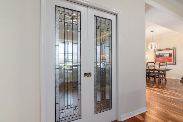 doorway featuring hardwood / wood-style floors