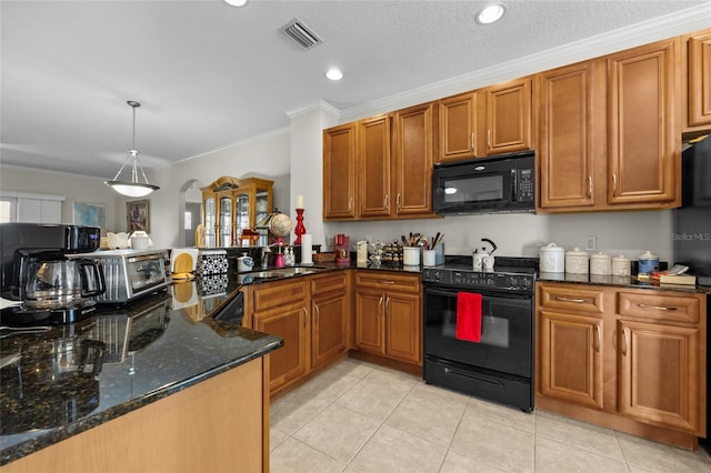 kitchen with sink, hanging light fixtures, kitchen peninsula, dark stone counters, and black appliances