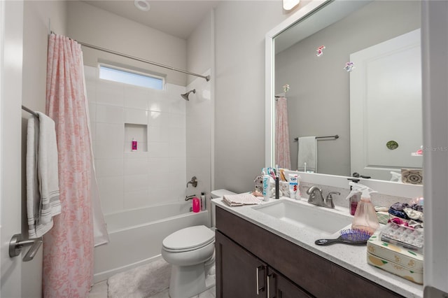 full bathroom featuring shower / tub combo with curtain, vanity, and toilet