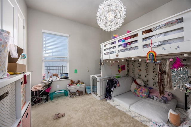 bedroom with a notable chandelier and carpet