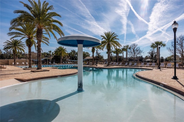 view of swimming pool featuring a patio