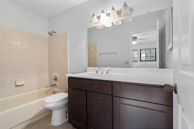 full bathroom with tile patterned flooring, vanity, shower / washtub combination, and toilet