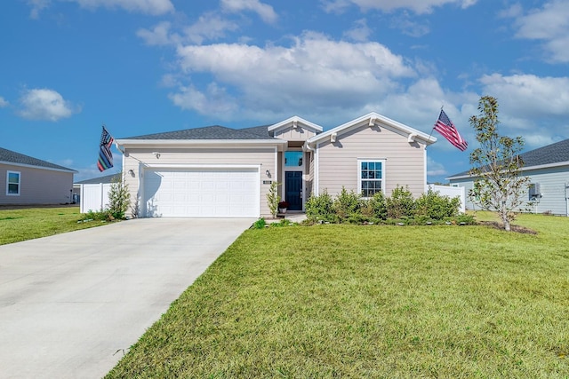 single story home with a garage and a front yard