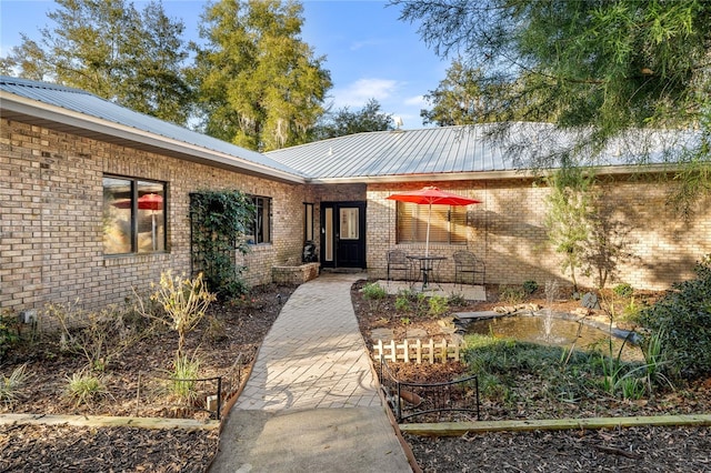 view of front of house with a patio area