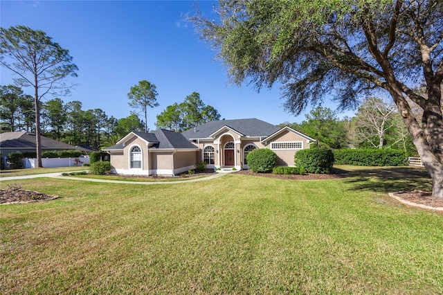 ranch-style house with a front lawn