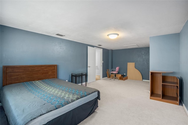 bedroom featuring attic access, visible vents, carpet floors, and baseboards