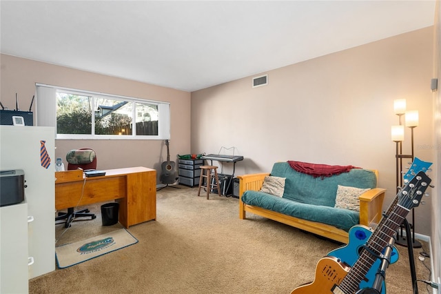 home office featuring visible vents and carpet flooring