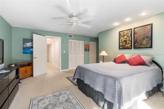 bedroom with recessed lighting, visible vents, ceiling fan, and light carpet