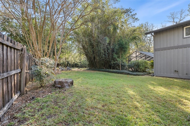 view of yard with fence