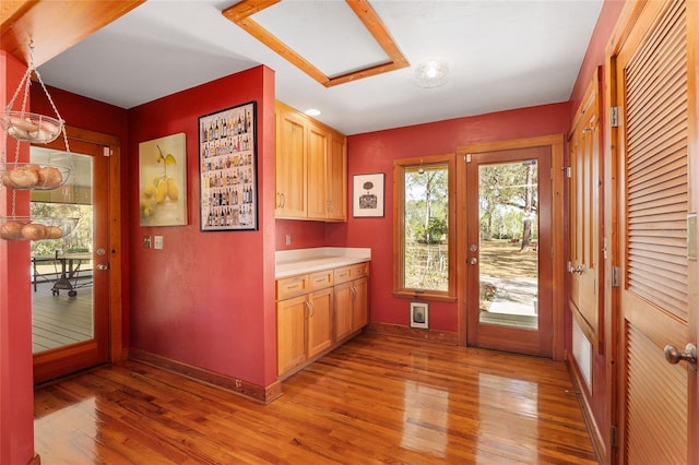 interior space featuring light brown cabinetry and light hardwood / wood-style floors