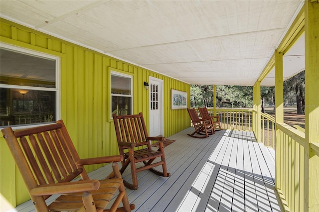 wooden deck featuring covered porch