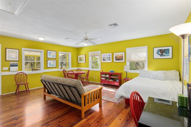 bedroom with wood-type flooring