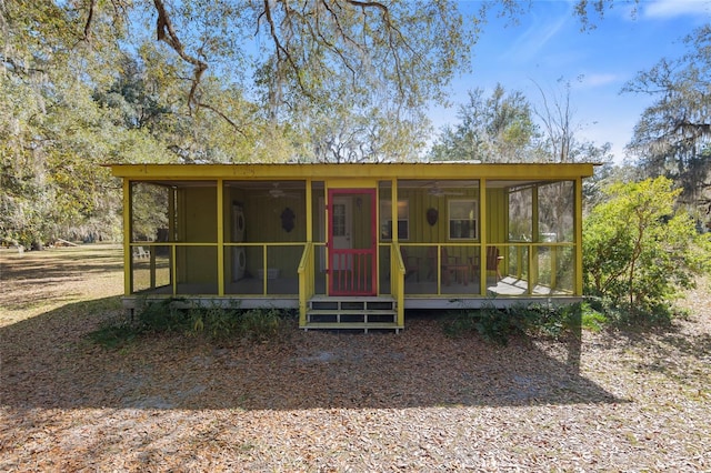 view of front of property with a sunroom