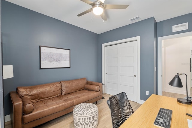 office area featuring hardwood / wood-style flooring and ceiling fan