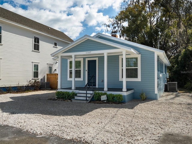 view of front of property featuring central AC unit and a porch