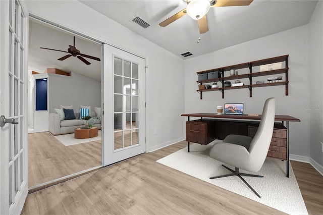 office space featuring ceiling fan, light wood-type flooring, and french doors