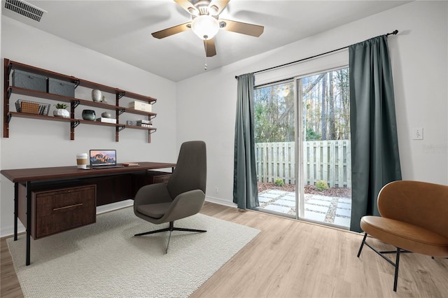 office area featuring ceiling fan and light wood-type flooring