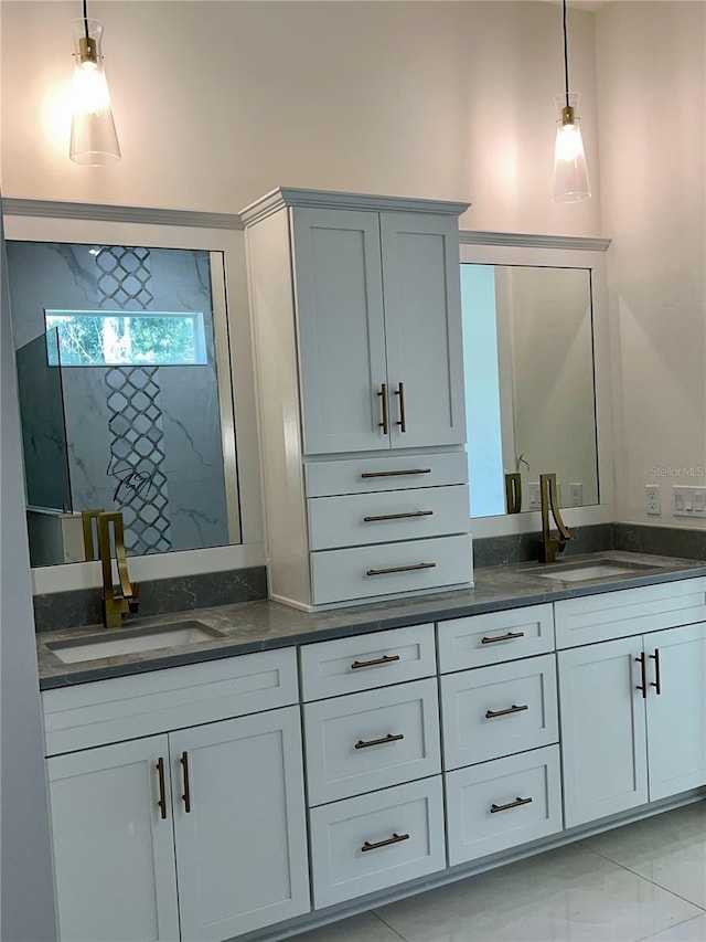 bathroom featuring vanity and a shower