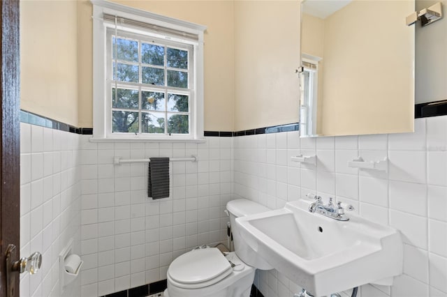 bathroom featuring toilet and sink