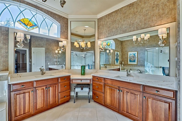 bathroom with tile patterned flooring, an enclosed shower, vanity, ornamental molding, and a chandelier