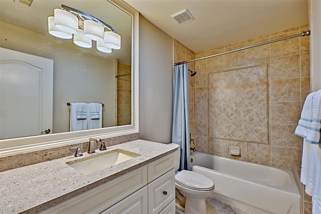 full bathroom featuring vanity, toilet, and shower / bath combo with shower curtain