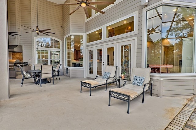 view of patio / terrace with french doors and ceiling fan