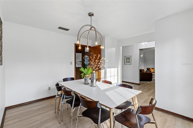 dining room featuring light wood-type flooring