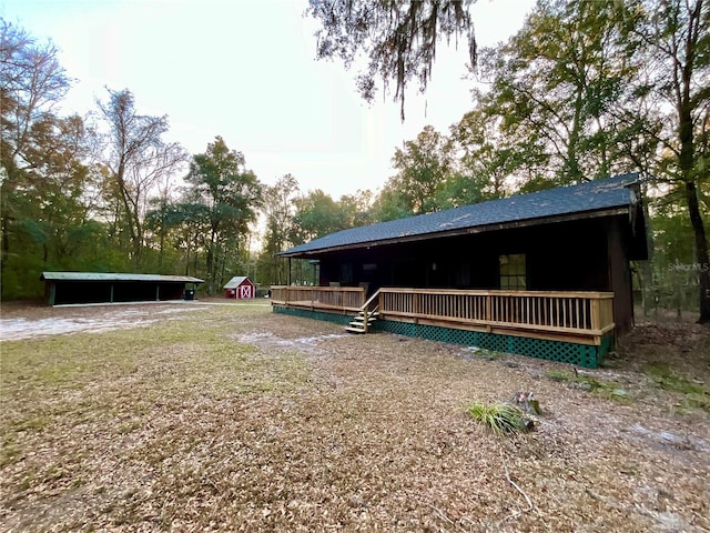 exterior space featuring an outbuilding