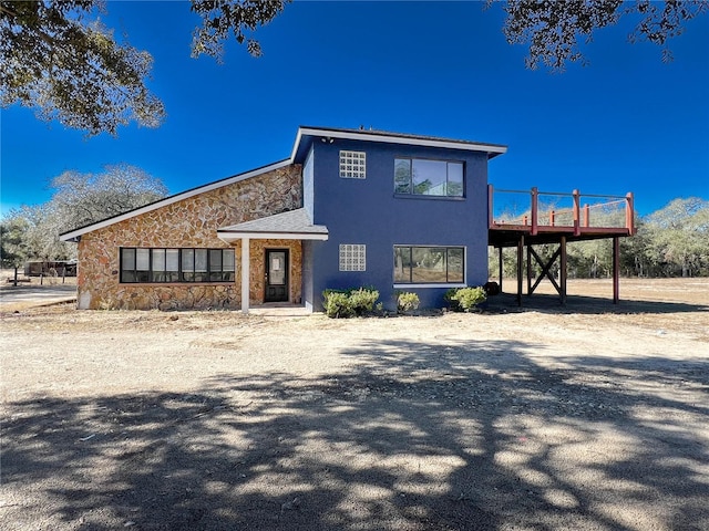 view of front of house with a deck